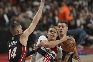 Kyshawn George (18) et les Wizards ont subi la loi du Heat samedi KEYSTONE/AP/Fernando Llano